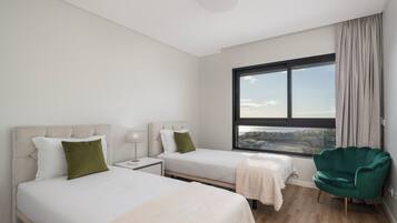 3 habitaciones, tabla de planchar con plancha, wifi y ropa de cama