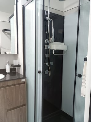 Comfort Studio, Beach View | Bathroom | Shower, hair dryer, towels, soap