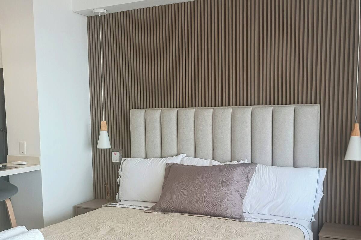 Comfort Studio, Balcony, Beach View | In-room safe, desk, blackout curtains, iron/ironing board
