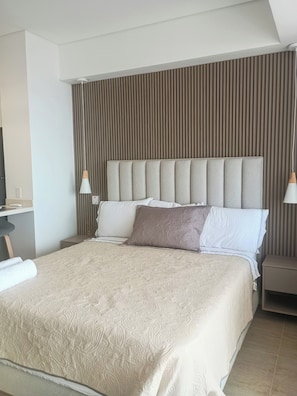 Comfort Studio, Balcony, Beach View | In-room safe, desk, blackout curtains, iron/ironing board