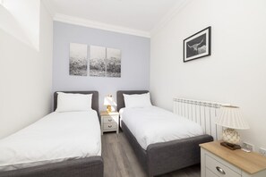 2 bedrooms, desk, iron/ironing board, travel cot