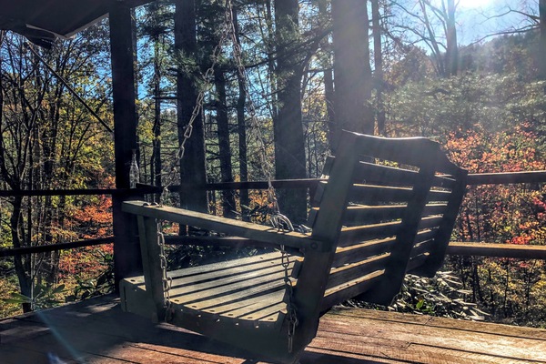 Listen to the river while you enjoy a cool breeze on the covered front deck.