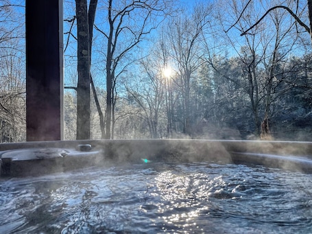 Outdoor spa tub. Secluded Mountain Hideaway by the New River l Hot Tub + Game Room l Pet-friendly