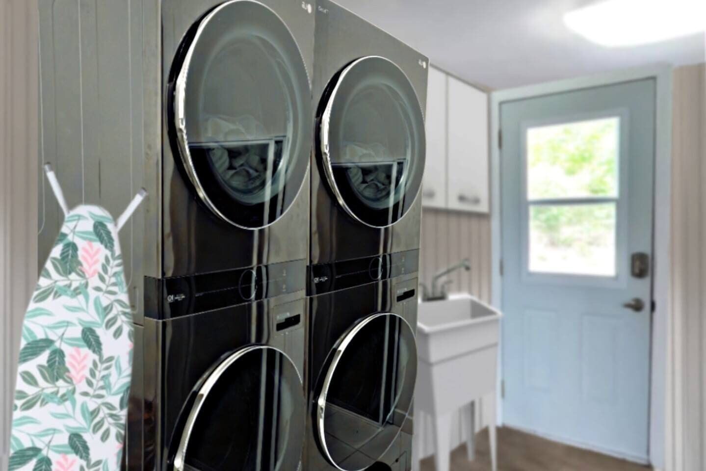 Une buanderie équipée de quatre sèche-linge fixés au mur et d’un évier, le tout dans une pièce dotée d’une porte et d’une fenêtre.