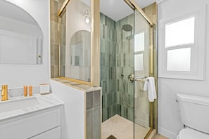 Shower, hair dryer, towels, soap