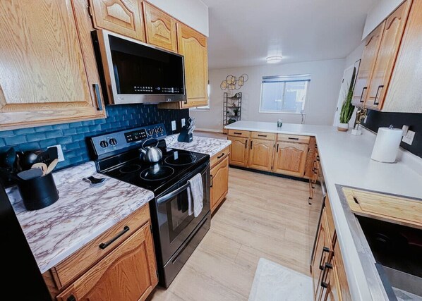 Fridge, microwave, oven, stovetop
