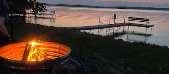 Charming 3-bedroom cabin right on the sandy shore of beautiful Star Lake.