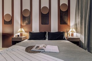 1 slaapkamer, een strijkplank/strijkijzer, wifi, beddengoed