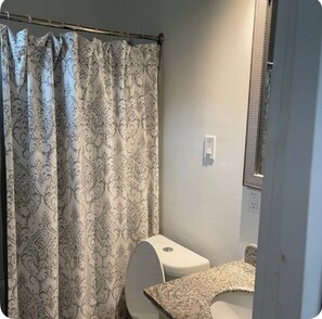 Hair dryer, towels, soap, toilet paper