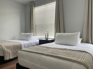 3 bedrooms, desk, iron/ironing board, travel crib