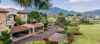 Spacious apartment with balcony views, pool access, kitchen & golf course nearby