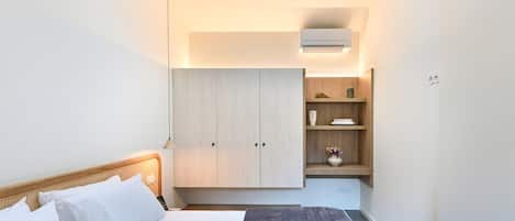 1 habitación, tabla de planchar con plancha, internet y ropa de cama