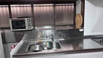 Fridge, microwave, stovetop, cookware/dishes/utensils