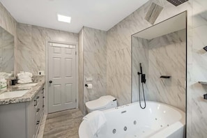 Shower, hair dryer, towels, shampoo