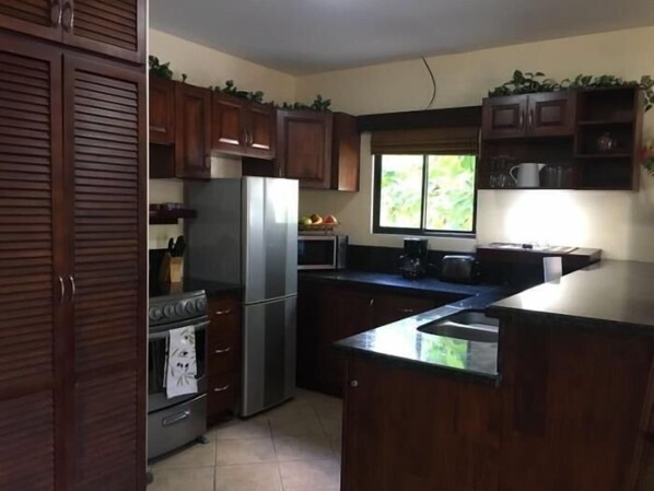 Fridge, microwave, oven, cookware/dishes/utensils