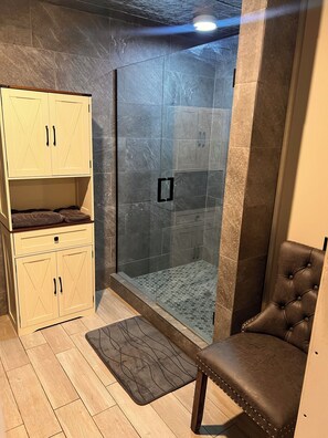 Shower, hair dryer, towels, soap