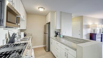 Fridge, microwave, dishwasher, coffee/tea maker