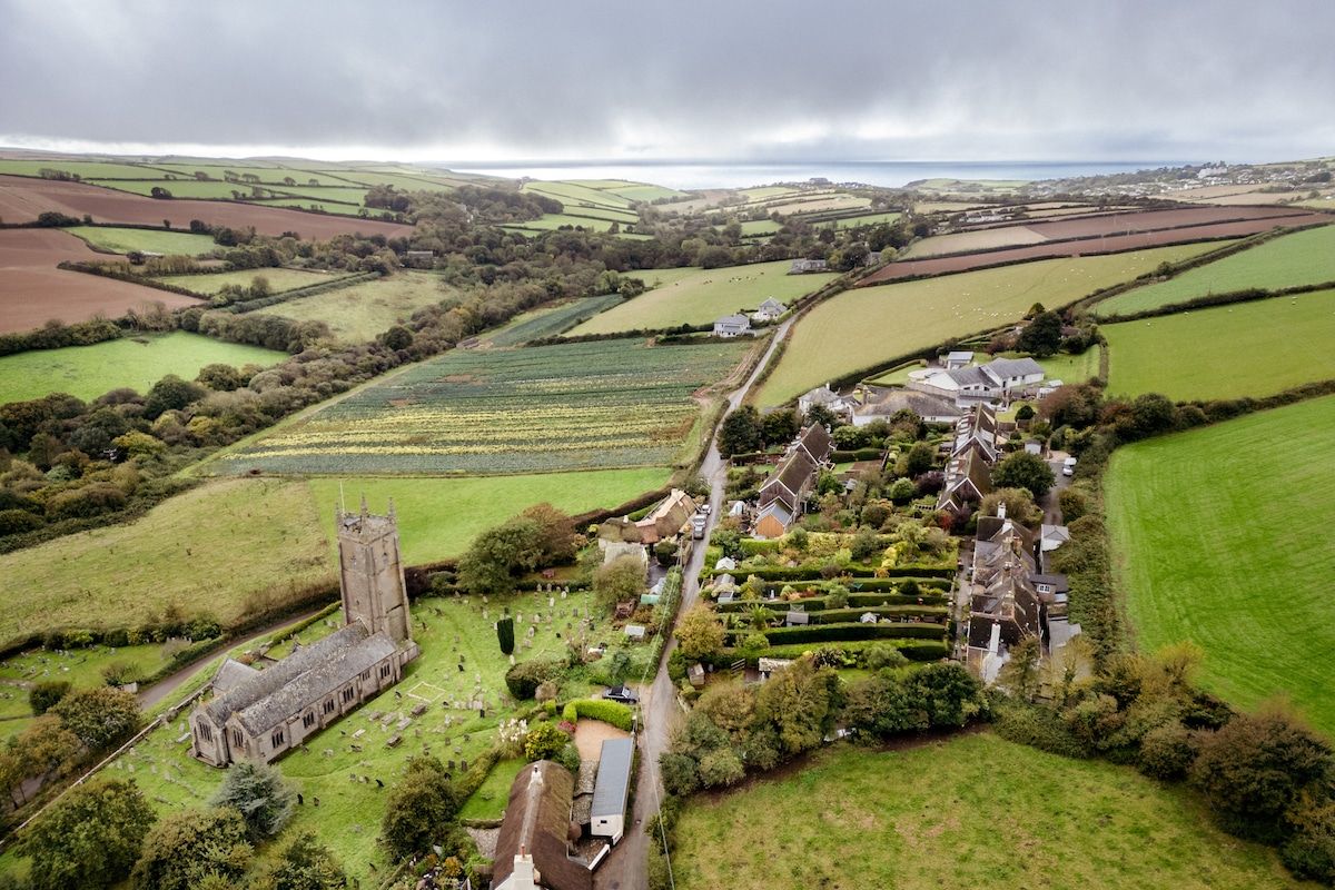 aerial view of cottages looking towards the sea at South Milton Sands