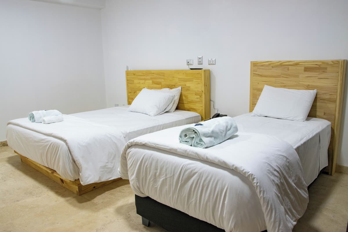 Egyptian cotton sheets, premium bedding, down duvets, memory-foam beds