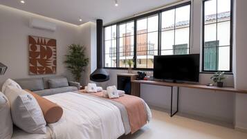 Premium bedding, pillow-top beds, in-room safe, laptop workspace