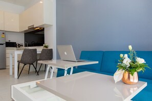 Exclusive Apartment, Balcony, Resort View | Living area