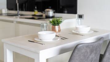 Exclusive Apartment, Balcony, Resort View | In-room dining