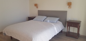 1 bedroom, desk, iron/ironing board, travel crib