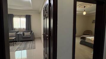 Luksus-suite | Opholdsområde | 42-tommers plasma-tv med satellitkanaler