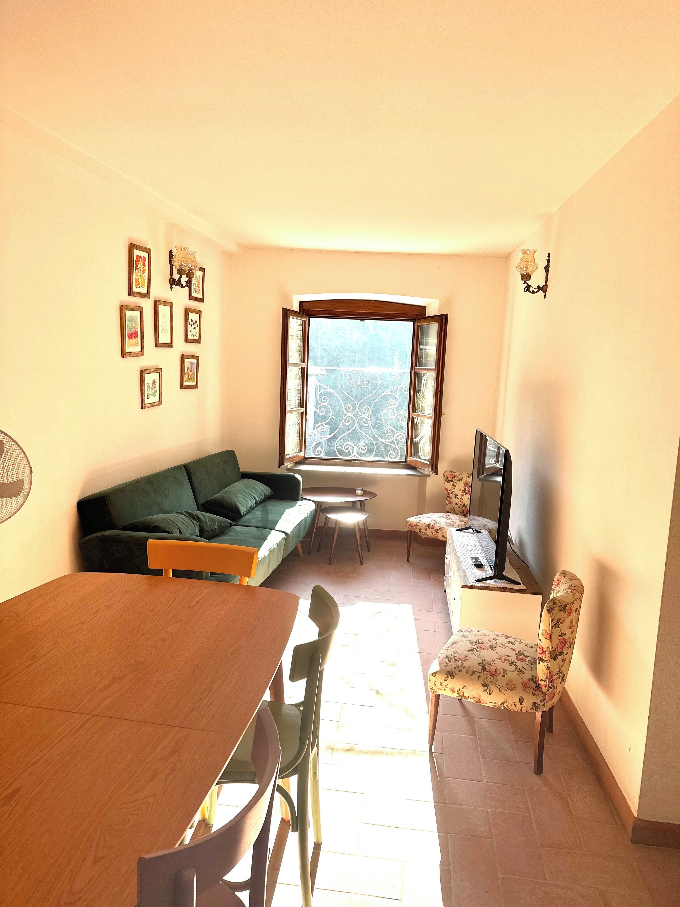 Apartment, River View | Living area | Flat-screen TV