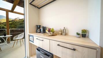 Executive Suite, Balcony, Partial Sea View | Coffee and/or coffee maker