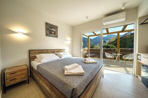 Executive Suite, Balcony, Partial Sea View | 1 bedroom, Egyptian cotton sheets, premium bedding, minibar - My Bali Suites (Mylopotamos)
