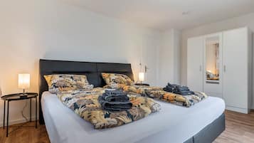 2 slaapkamers, een strijkplank/strijkijzer, gratis wifi, beddengoed