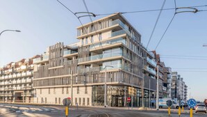 A modern hotel with multiple floors, large windows, and a prominent entrance. - Apartment in Belgium near Marina Nieuwpoort (Nieuwpoort)