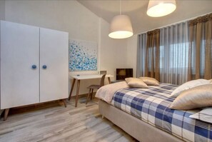 2 chambres, fer et planche à repasser, Wi-Fi, draps fournis