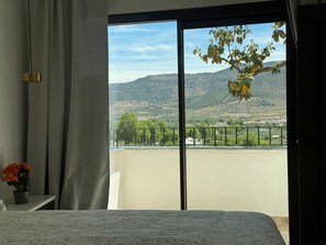 Apartment, 3 Bedrooms, Balcony, Mountain View | Down comforters, pillowtop beds, blackout drapes, soundproofing - CASA YANGUAS APARTAMENTOS RURALES (Laujar de Andarax)