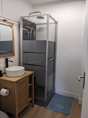 Shower, hair dryer, towels, soap