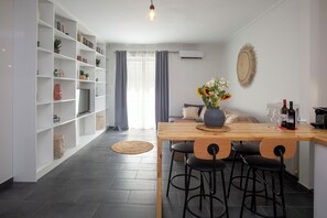 Classic Apartment, 2 Bedrooms, Non Smoking, Balcony | Living area | 40-inch Smart TV with cable channels, books