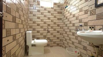 Family Quadruple Room, City View | Bathroom | Shower, towels, shampoo, toilet paper