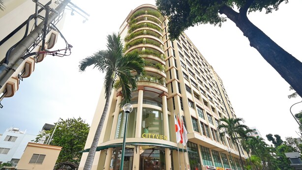 A tall building with a curved facade, multiple balconies, and a prominent entrance labeled "CITYVIEW". -  Cityview Serviced Apartment & Hotel Ho Chi Minh (Ho Chi Minh City)