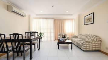 Basic Apartment, 1 Bedroom | Living area | 32-inch LCD TV with cable channels, DVD player