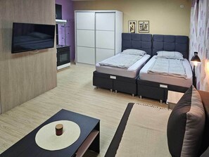 1 chambre, fer et planche à repasser, Wi-Fi, literie fournie