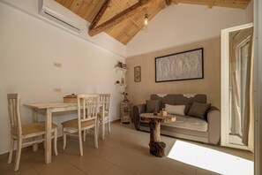 Traditional Apartment, 2 Bedrooms, Mountain View | Living area | 32-inch flat-screen TV with satellite channels - Casa Abuelo Cottage (Zakynthos)