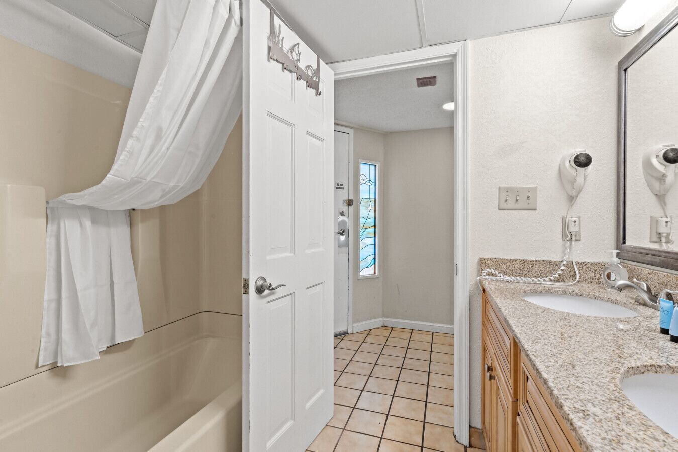 Eco-friendly toiletries, hair dryer, towels