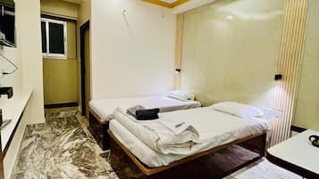 Double or Twin Room, City View | Desk, laptop workspace, soundproofing, iron/ironing board