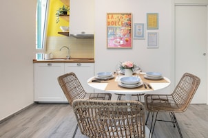 Superior Apartment | Private kitchen | Fridge, microwave, stovetop, highchair