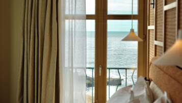 Junior Suite, Ocean View | Premium bedding, in-room safe, soundproofing, iron/ironing board