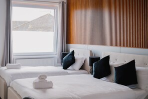 Habitación Deluxe con 1 cama doble o 2 individuales | Caja fuerte, escritorio, espacio para trabajar con un portátil