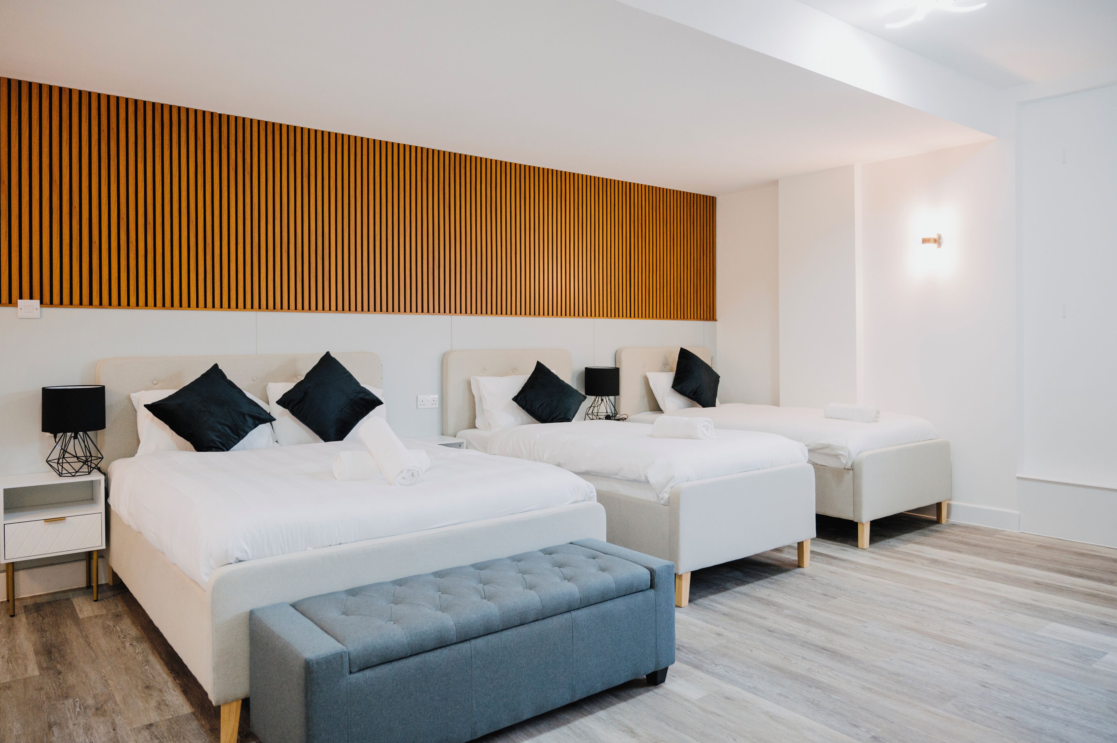 Deluxe Triple Room | In-room safe, desk, laptop workspace, soundproofing