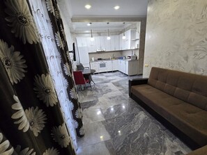 Living area - Charming 1-bedroom apartment in amazing Batumi with AC, WiFi (Batumi)