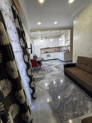 Living area - Charming 1-bedroom apartment in amazing Batumi with AC, WiFi (Batumi)